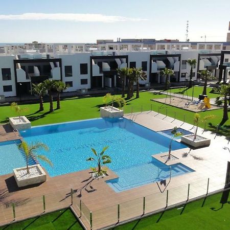 Oasis Beach 5 Apartment โอริอุเอลา ภายนอก รูปภาพ