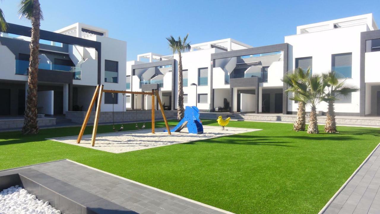 Oasis Beach 5 Apartment โอริอุเอลา ภายนอก รูปภาพ
