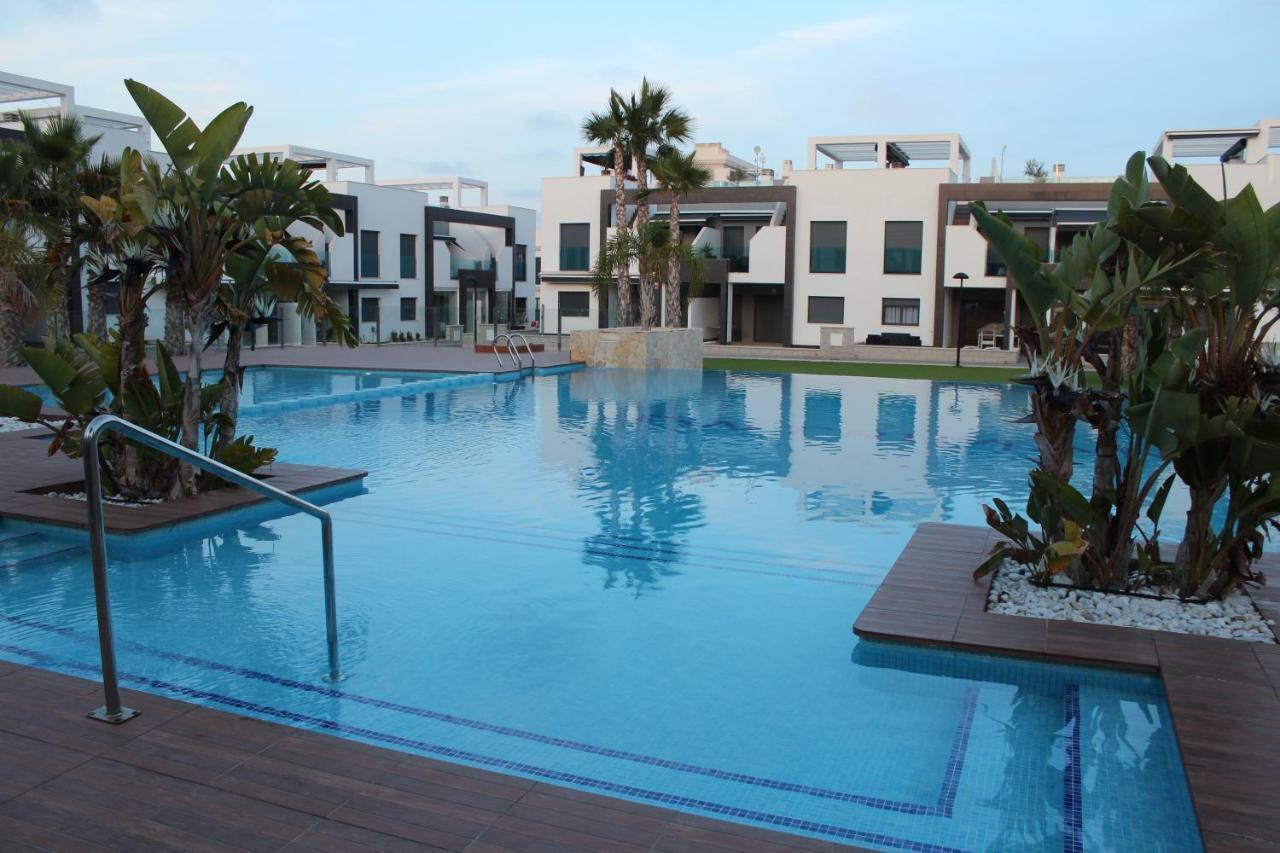 Oasis Beach 5 Apartment โอริอุเอลา ภายนอก รูปภาพ