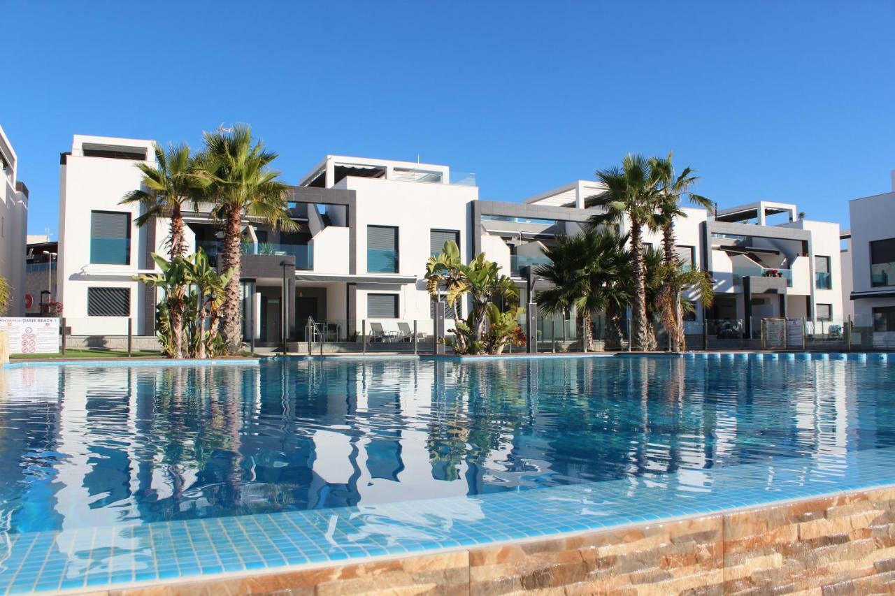 Oasis Beach 5 Apartment โอริอุเอลา ภายนอก รูปภาพ